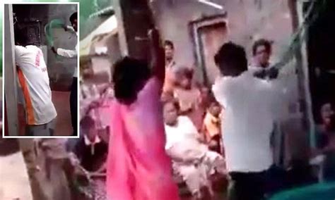 Indian Husband Shown Tying Up His Cheating Wife And Her Lover Before Beating Them Daily Mail