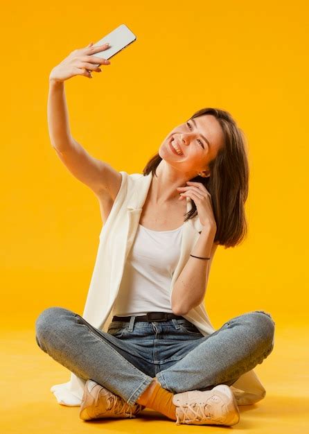 premium photo front view of woman taking a selfie