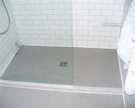 Penny round tile will bring a fresh new look to your kitchen or bathroom. Gray Penny Tile Home Design Ideas, Renovations & Photos