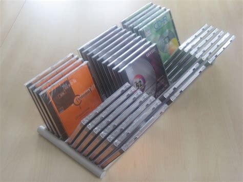 Die schubladen sind so konstruiert, dass sie zu allen herkömmlichen schubladen, magazinen schubladen derselben breite sind selbst bei unterschiedlicher länge problemlos stapelbar. CD Aufbewahrung CD Blätter Flip für 33 CDs mit Seitenteil | eBay