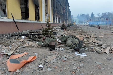 Ukrainian Officials Post Photos Of Dead Russian Soldiers Online