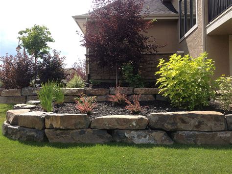 Maybe you would like to learn more about one of these? Natural stone retaining wall - Landscape 360