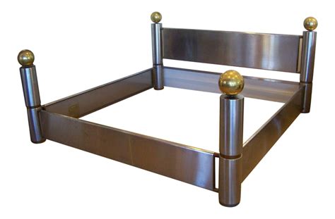 Amazing Stainless Steel And Brass King Bed Frame On Bed