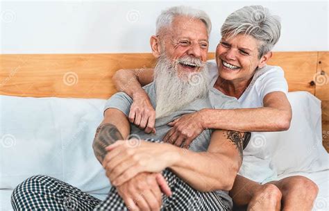 Mature Couple Enjoying Time Together At Home After Waking Up Senior Man And Woman Having