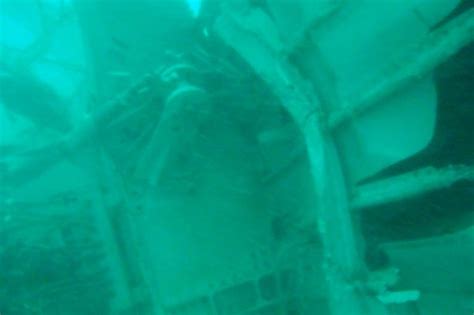 Airasia Flight Qz8501 First Pictures Reveal Mangled Wreckage Of Crashed Passenger Jet On Sea