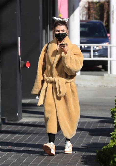 Olivia Jade Giannulli Wearing A Cozy Coat Leggings And Sneakers West
