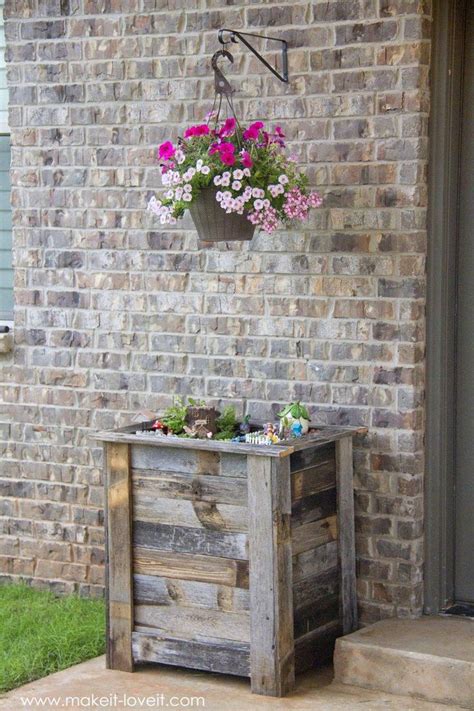 These tall outdoor planters are very easy to build and the materials only cost $20. 10 Tall Planter Box Plans for DIY - Vertical & Trapezoid ...