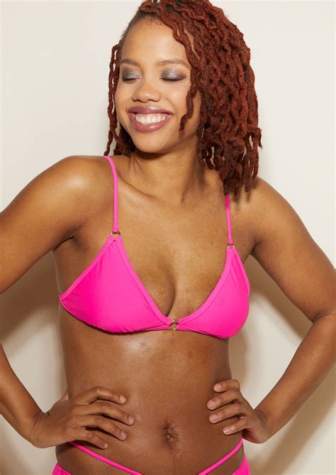 Got you in an electric mood. Neon fuchsia bikini top featuring gold