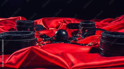 Bdsm Outfit Bondage And Gag Ball On The Red Linen Adult Sex Games