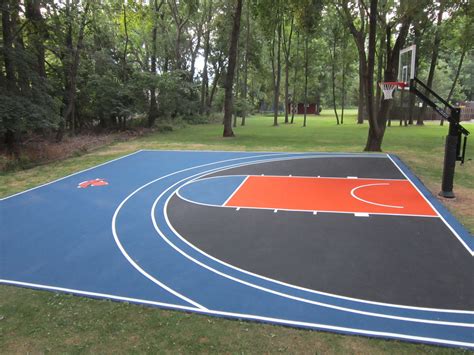 It offers a place to practice the sport and work out without leaving home. Check out this backyard Knicks basketball court ...
