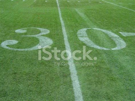 They combine with the other prescriptive and descriptive parts of the laws of the game to determine so. Football Field 30 Yard Line Stock Photos - FreeImages.com