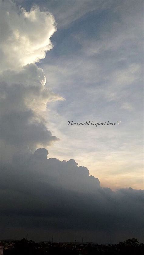 The Sky Is Filled With Clouds And There Is A Quote Above It That Says