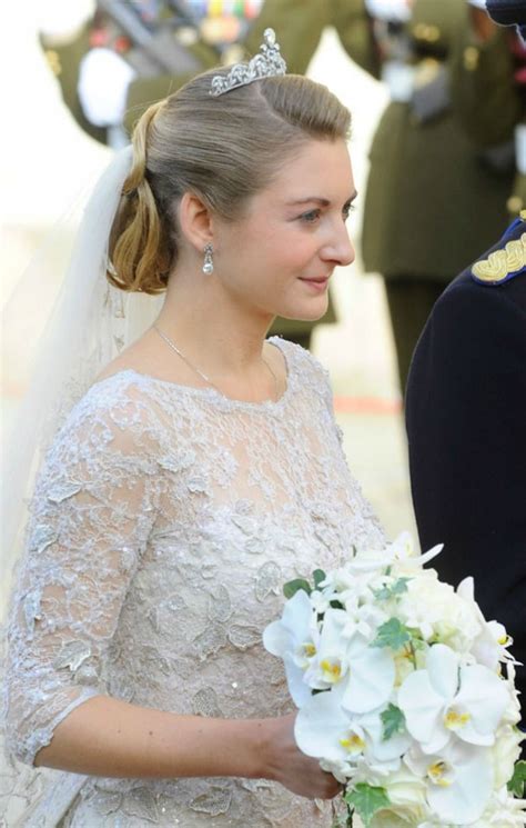 Prince louis and princess tessy of luxembourg with their children pose after the christening ceremony of princess amalia at the saint ferreol chapel in lorgues on july 12, 2014 in lorgues, france. Princess Stephanie of Luxembourg wearing a lace gown and ...