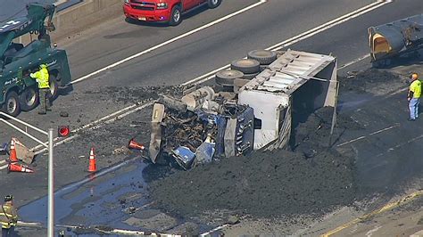 Overturned Truck Spills Contents Over New Jersey Turnpike Backing Up