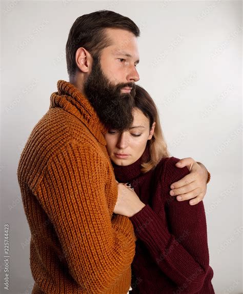Bearded Handsome Man Hugging His Sad Girlfriend Beautiful Woman Is Upset Man Comforting His