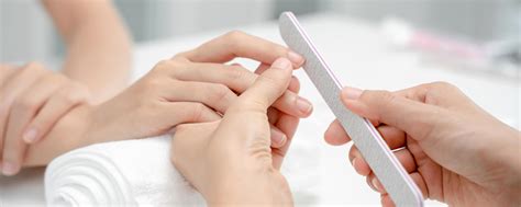 Woman receive care service by professional Beautician Manicure at spa