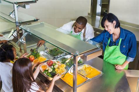 Students Choosing Healthy Food In School Cafeteria Lunch Line Stock