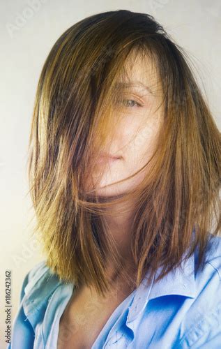 Portrait Of Beautiful Young Woman Messy Hair Covering Her Face Selective Focus Film Style