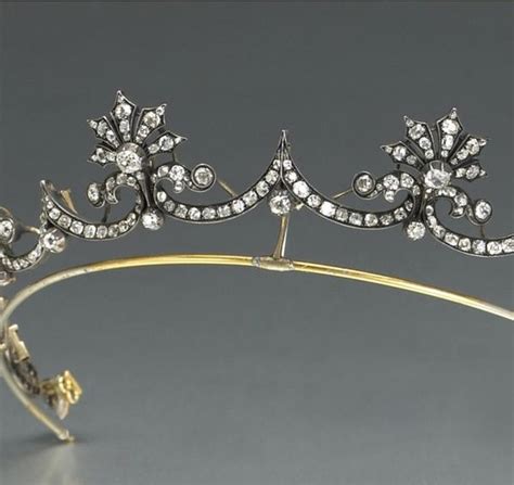 A Petite Diamond Tiara With Small Diamond Spray Motifs Linked By