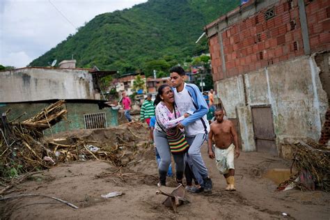 Rain Fueled Landslide Sweeps Through Venezuela Town 22 Dead