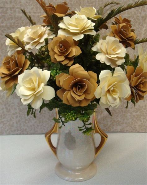 While every anniversary should be a huge celebration, it is always nice to pay special attention to milestone anniversaries such as the first, fifth, 10th, 25th, 30th, 40th, 50th, 60th and 75th year. Ivory and Gold Paper Flower Arrangement Perfect for 50th ...