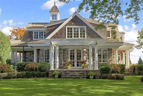 Traditional 2 Story Classical Stone Front Porch House