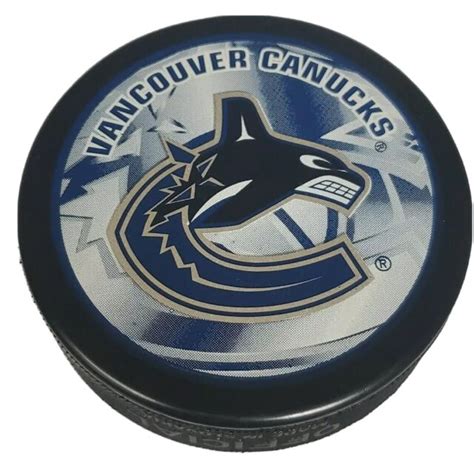 vancouver canucks rare logo official hockey puck made in 🇸🇰 inglasco ebay