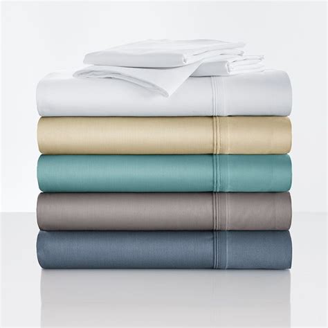 Four Sheets Stacked On Top Of Each Other In Different Colors And Sizes