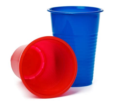 Premium Photo Colored Plastic Cups Isolated On White