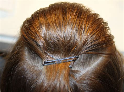 Swap out your traditional hair tie and lock in your look by using bobby pins to create a triangle design. Bobby Pin Hairstyles | Beautiful Hairstyles