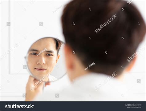 Handsome Young Man Looking Mirror Stock Photo 1250555011 Shutterstock