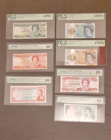 World 7 Banknotes All Graded Various Dates Queen Catawiki