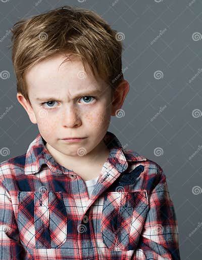 Offended Young Child Sulking And Pouting Expressing Kid Anger Stock