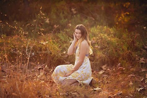 Girl In Field For Her High School Graduation Photography Session With