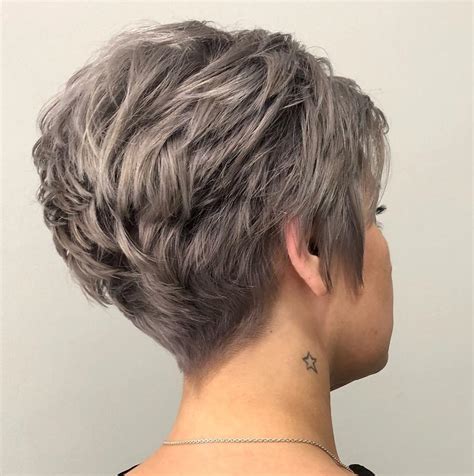 A deep parting on kristen stewart gives a fresh punk vibe to a longer pixie cut. Feathered Pixie Hair Styles - Wavy Haircut