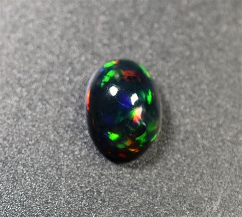Ethiopian Black Opal Oval Shape 380 Cts Flashy Multi Fire Opal