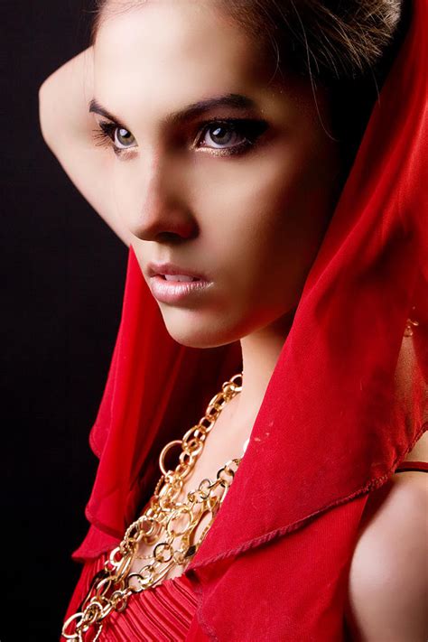 Beautiful Model In Red Dress Posing In Studio Photograph By Daniel