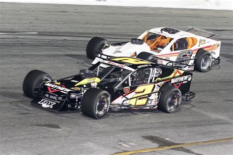 It isn't nascar — it's arca — and these are old cup cars anyway, so close enough. LFR & Troyer Race Cars Merging Operations | SPEED SPORT