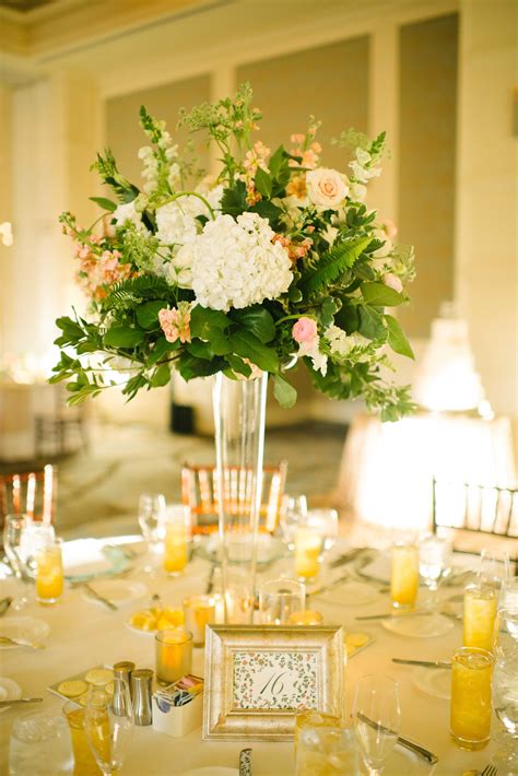 Romantic light pink, pure white or elated blue, when mixed with flowers like viburnum, molucella, and ozothamnus those beautiful hydrangea blooms shine even more. rupp wedding flowers | Tall flower centerpieces, Wedding ...