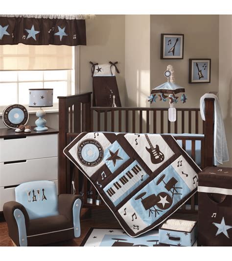 She has the crib bedding already and the mobile. Lambs & Ivy Rock N' Roll 5 Piece Crib Bedding Set