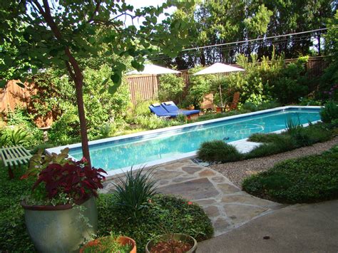 Endless, saltwater, fiberglass and concrete designs. Lap Pool in natural setting | Lap pool, Outdoor decor, Pool