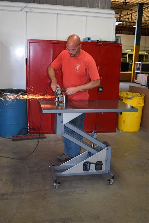 Welding Table Is Hydraulic And On Casters Perfect For A Welding Shop