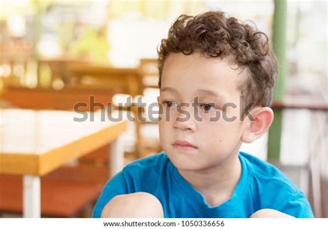 Sad Boy Sitting Alone Unhappy Lonely Stock Photo 1050336656 Shutterstock