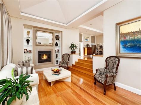 Custom quarried stone was used on the base of the home and new siding applied above a belly band. split level interior | Ideas for the House | Pinterest