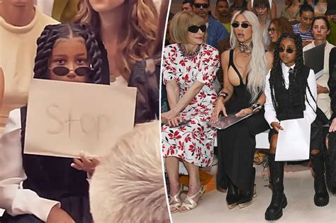 kim kardashians daughter north west holds ‘stop sign for paparazzi at paris fashion show ryan