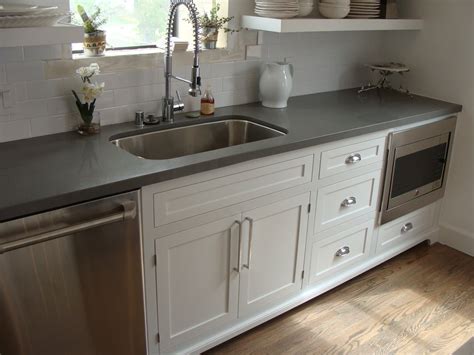 Caesarstone grey quartz countertops come in a variety of colors, textures, and finishes. Custom Shaker with inset doors and concrete gray quartz ...