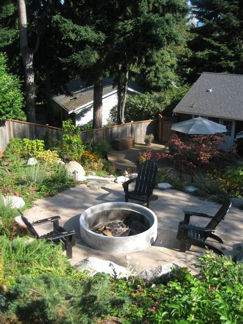 Dig out the ground under the fire pit and then lay a tile leading to wherever you want the water to go. Lets place a fire pit on your slope so the kids have a ...