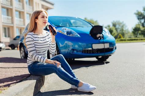 Pretty Young Woman Sitting In Front Of Her Car Stock Image Image Of
