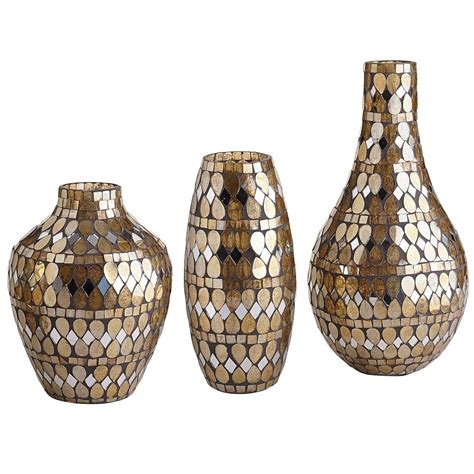 Try some larger species of indoor trees to max out this effect and reduce the use of your office ac. Golden Mosaic Vases from Pier 1 imports