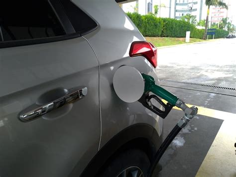 Premium Photo Fueling Vehicle With Fuel Ethanol Ou Gasoline Fuel